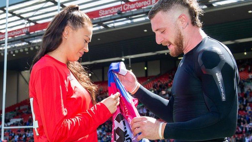 Stephanie Gaunt presented with a shirt by Jackson Hastings