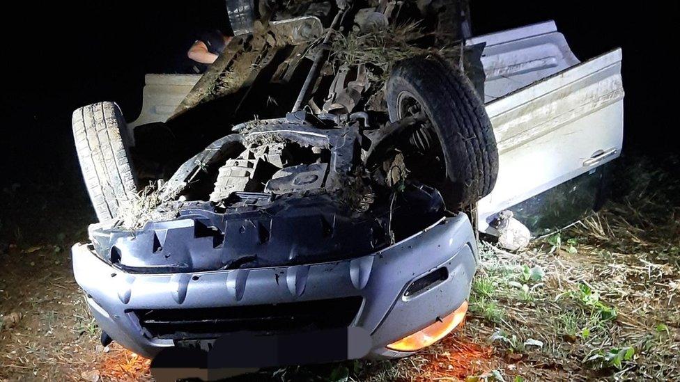 Car on its roof