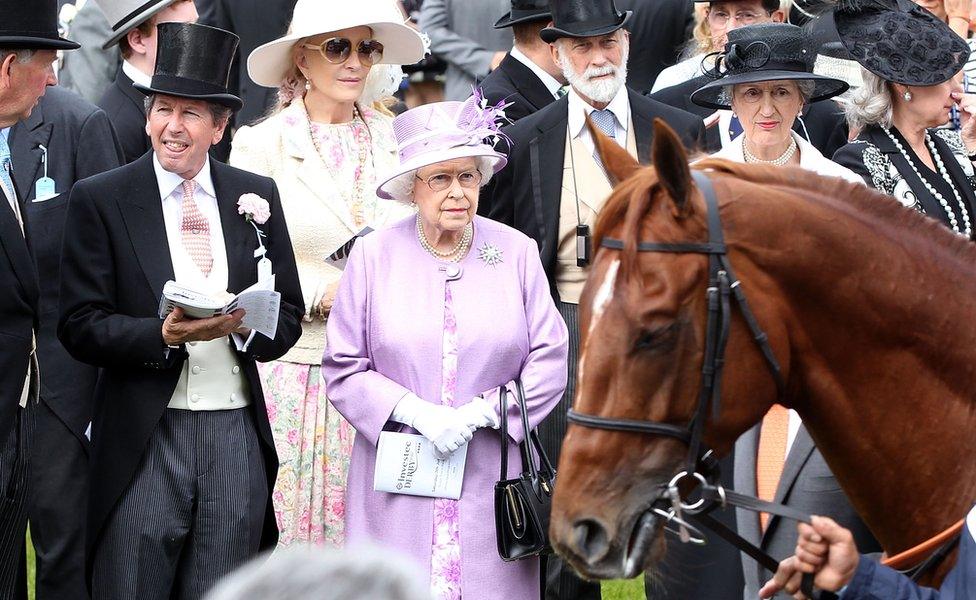 The Queen with racing manager John Warren at the Derby on 7 June 2014