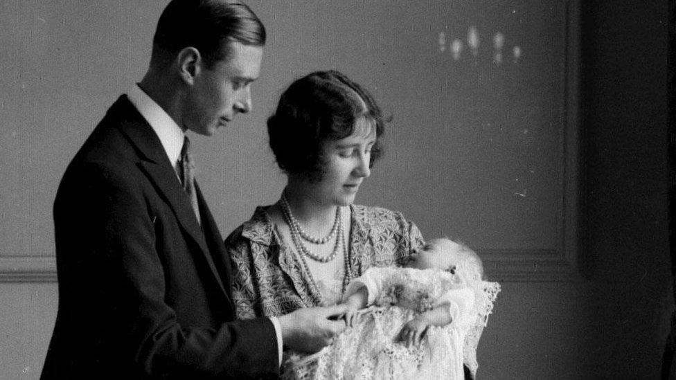 Princess Elizabeth as a baby, with her parents