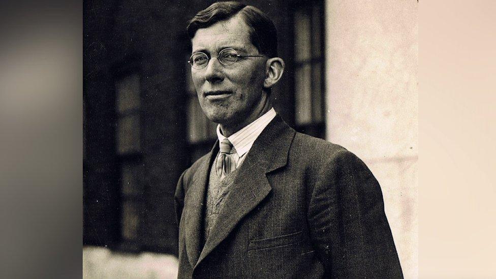 Old black and white photograph of Paul Sturge. He is wearing a suit and looking at the camera with a slight smile on his face.