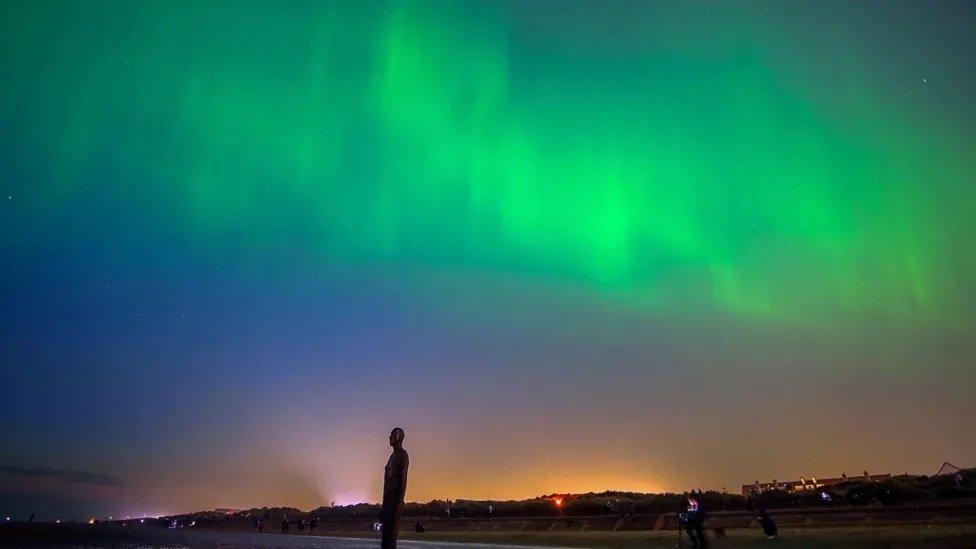 Bright light filled the sky above Crosby Beach in Liverpool.