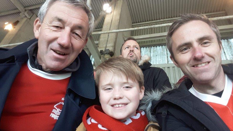 Neil (right), his dad and his son George