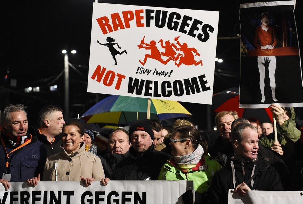 Protestors from the PEGIDA movement (Patriotic Europeans Against the Islamisation of the Occident) march during a rally in Leipzig on January 11, 2016