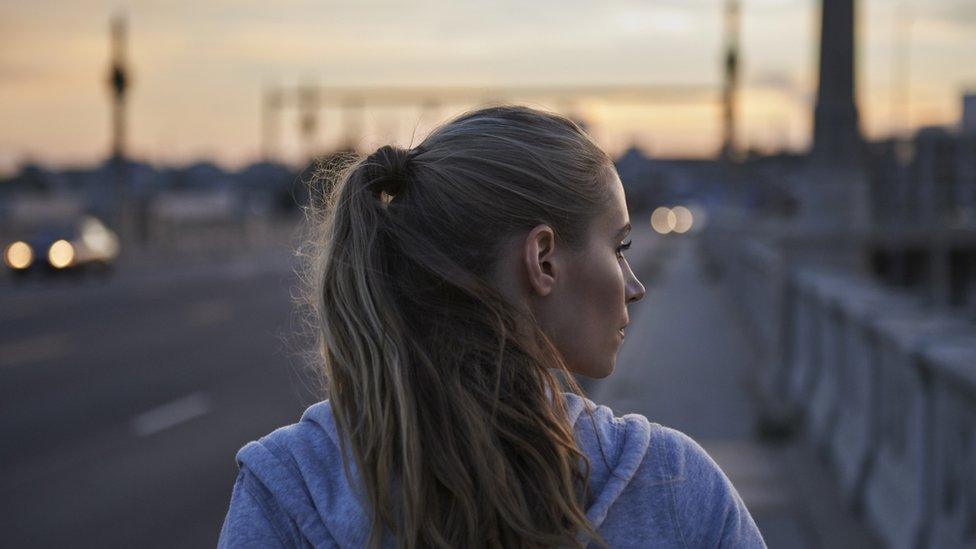 Stock image of a woman from the side