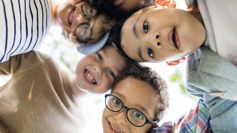 Happy children in a circle