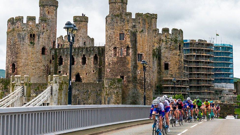 Riders pass Conwy castle