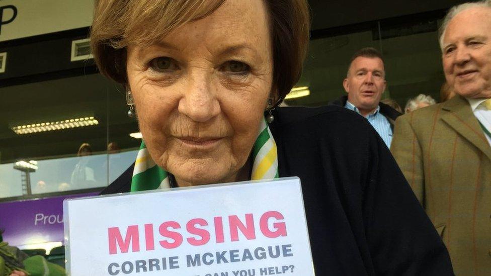 Delia Smith holding a police poster asking for information about missing 23-year-old Corrie Mckeague.