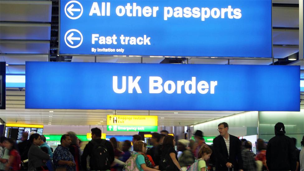 Passengers going through the UK Border at Terminal 2 of Heathrow Airport