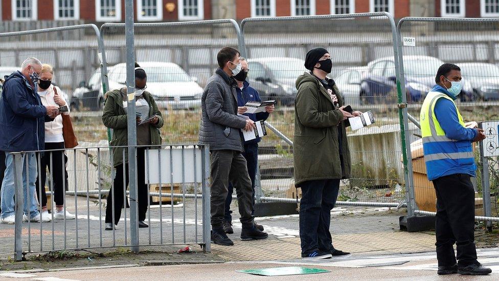 People queue for tests in Bolton