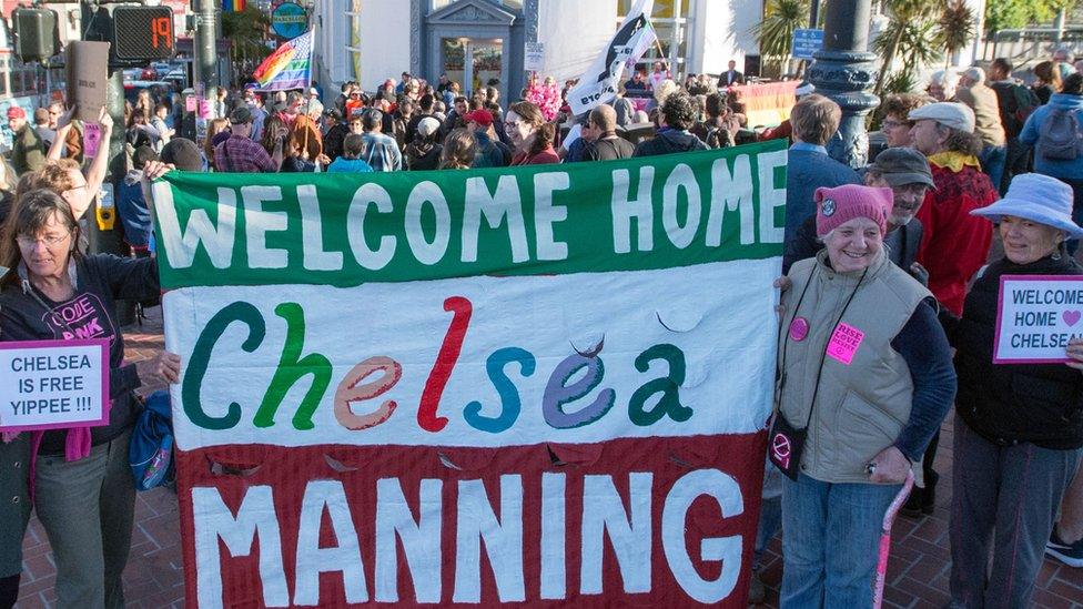 Demonstrators hold 'Welcome Home Chelsea Manning' banner at event in San Francisco to coincide with her release