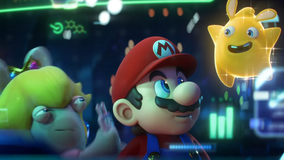 Mario looks up at a floating star with ears, animated in the style of the Rabbids characters