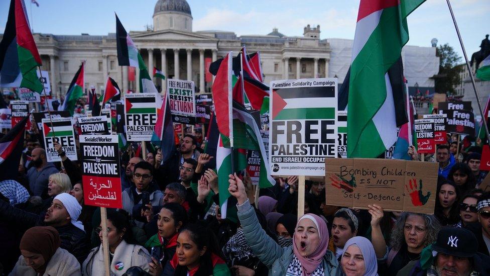 People at a rally in Trafalgar Square, London, during Stop the War coalition's call for a Gaza ceasefire