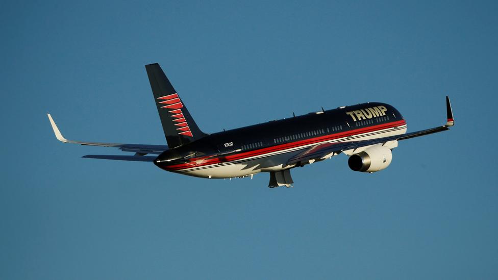 Republican U.S. presidential nominee Donald Trump departs in his plane after rallying with supporters in a cargo hangar at Minneapolis Saint Paul International Airport in Minneapolis, Minnesota, U.S. November 6, 2016