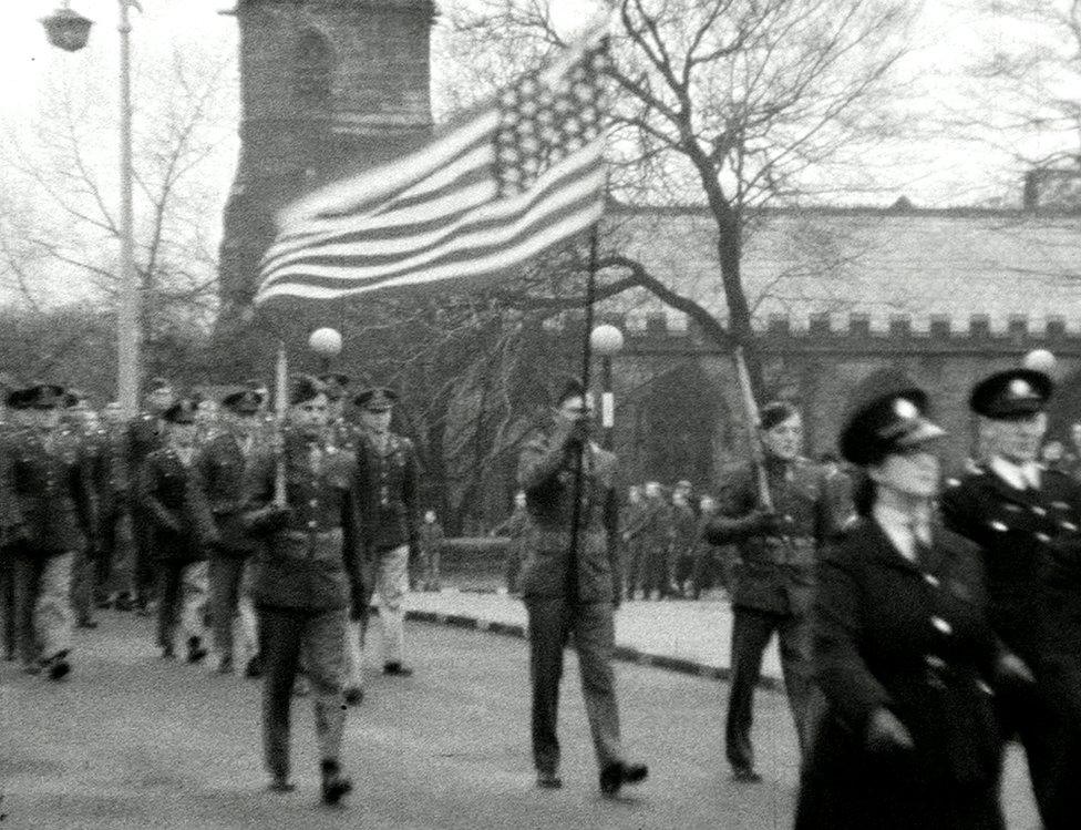 Flag being used in parade in 1942