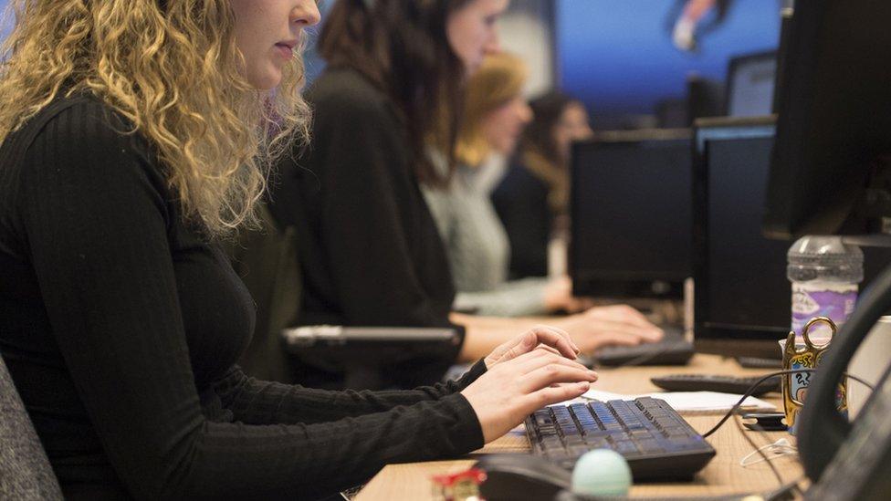 Workers at desks