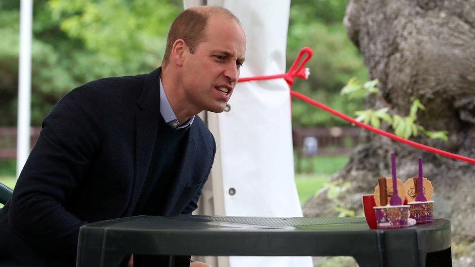 Prince William looking at ice cream