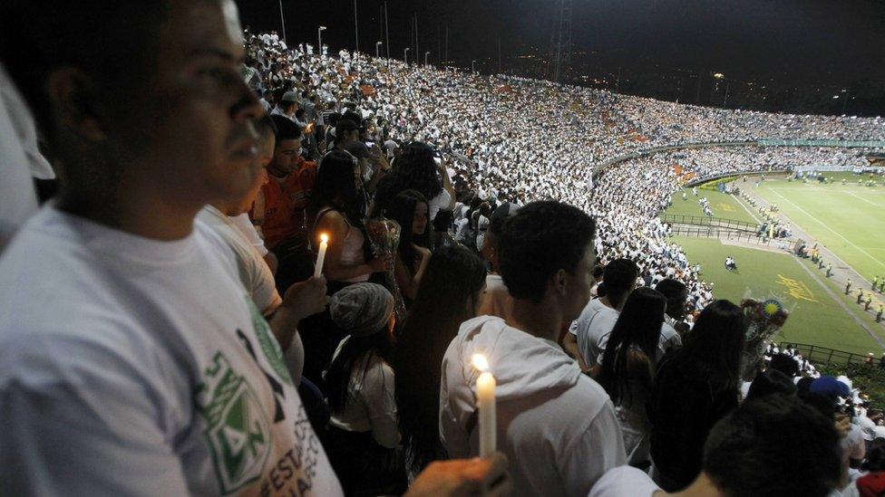 Fans of Atletico Nacional soccer club pay tribute to the players of Brazilian club Chapecoense killed in the recent airplane crash, in Medellin, Colombia, September 30, 2016