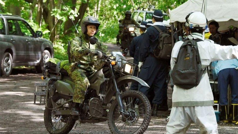 A Japanese SDF member on a motorbike in Hokkaido (1 June 2016)