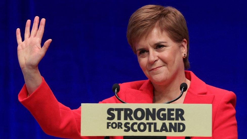 Nicola Sturgeon waving during press conference for Scottish Independence - Stronger for Scotland