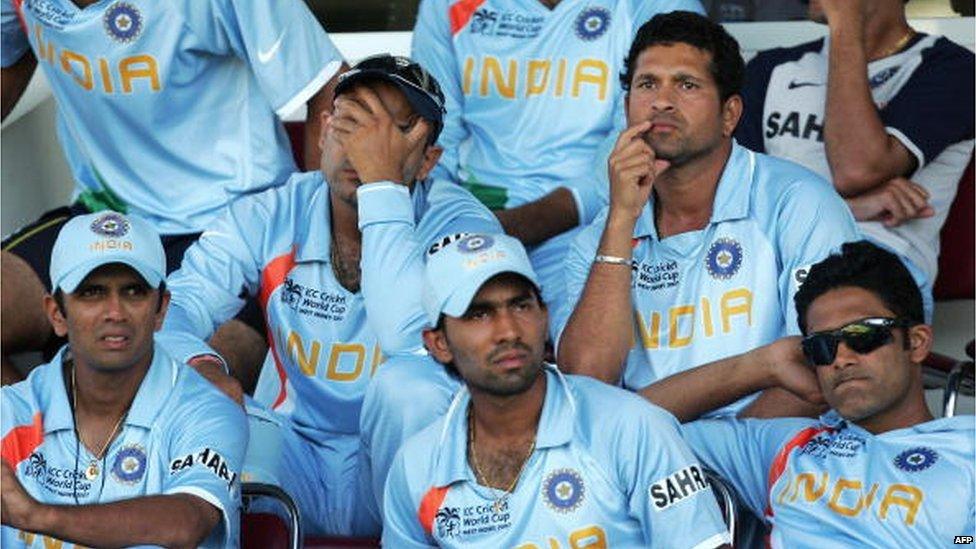 Indian cricketer Virender Sehwag (Top L) covers his face as he watches his team bat against Sri Lanka with teammates Sachin Tendulkar, (Top-R) captain Rahul Dravid, (Bottom L) Dinesh Karthick (Bottom C) and Anil Kumble (Bottom R) at the Queen's Park Oval, in Port of Spain, in Trinidad and Tobago, 23 March 2007, in the Group Stage of the ICC Cricket World Cup 2007