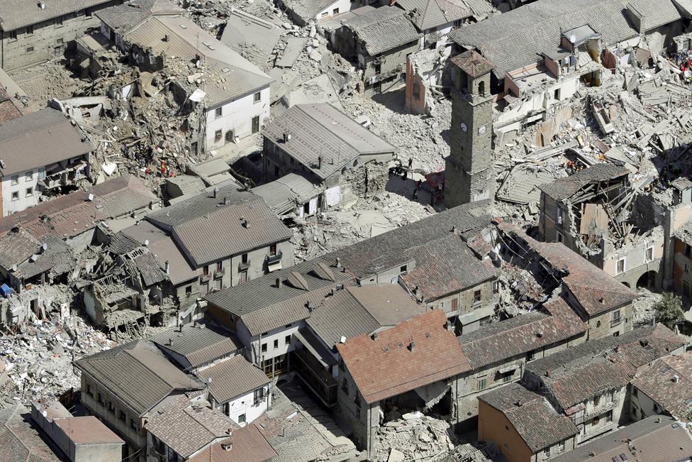 This aerial photo shows the damaged buildings in the centre of Amatrice - 24 August 2016