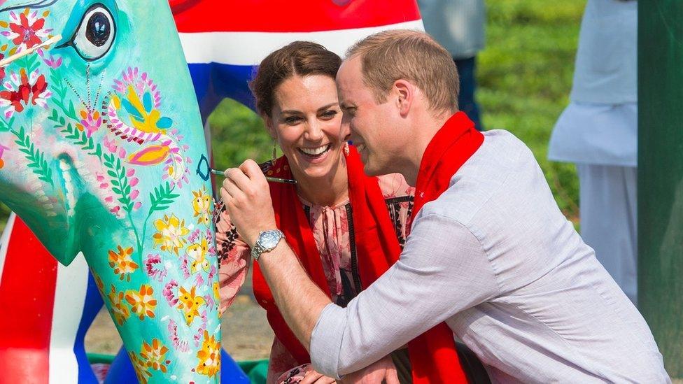 The Duke and Duchess of Cambridge decorate an Elephant Parade statue during a visit to the Mark Shand Foundation at Kaziranga National Park, in Assam, India, on 13 April 2016