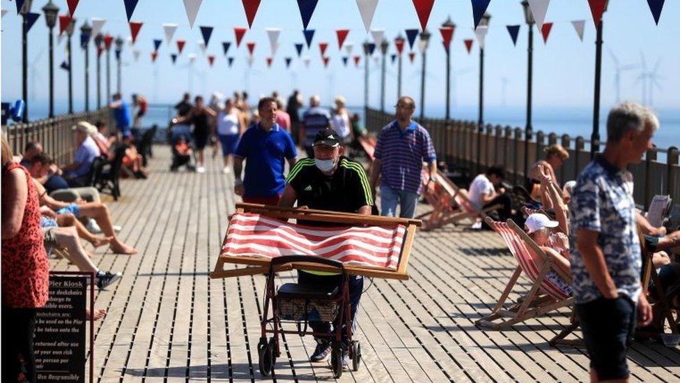 People on Skegness Pier as the warm weather continues