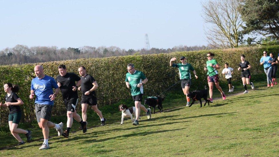 Kevin Ward running with his dog Wilson at the Kesgrave Parkrun