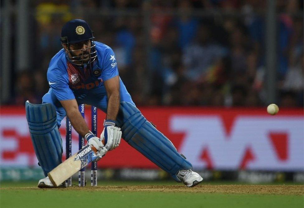 This file photo taken on March 31, 2016 shows India's captain Mahendra Singh Dhoni plays a shot during the World T20 semi-final match between India and West Indies at The Wankhede Cricket Stadium in Mumbai.