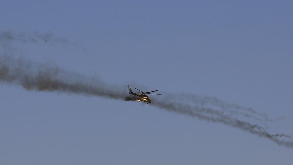 An Iraqi government helicopter gunship in action over Falluja, 30 May