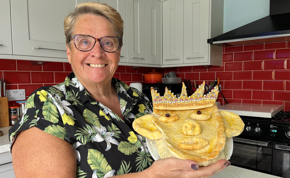 Jackie Marshall with her"royal pie" which was filled with home-grown apple and rhubarb