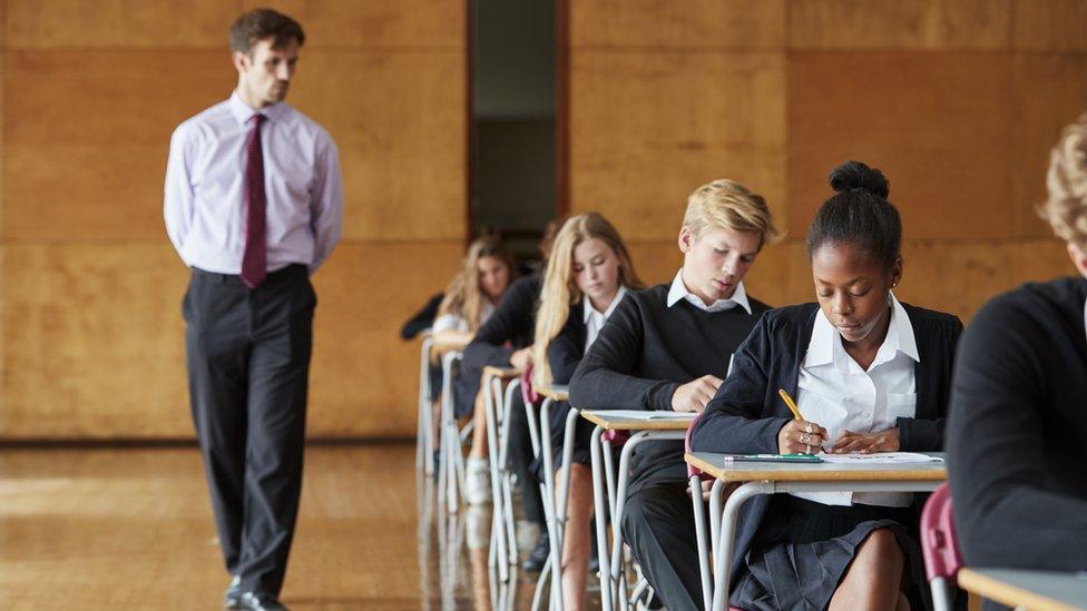 pupils sitting school exam