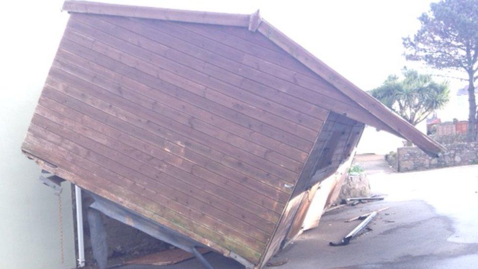 Stable on top of a house wall in Alderney