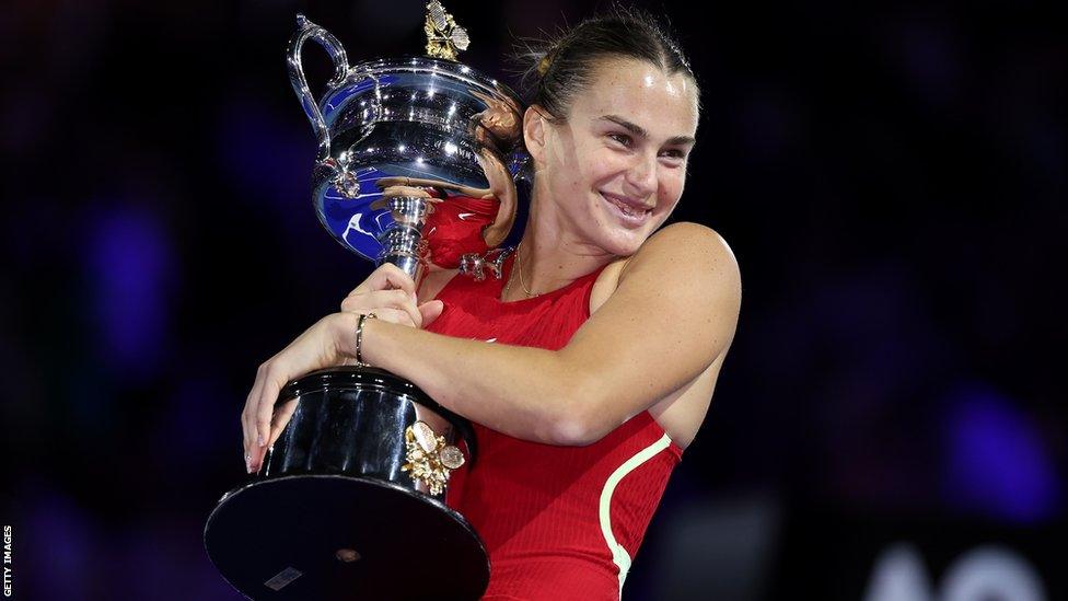 Aryna Sabalenka poses with the Daphne Akhurst Memorial Cup