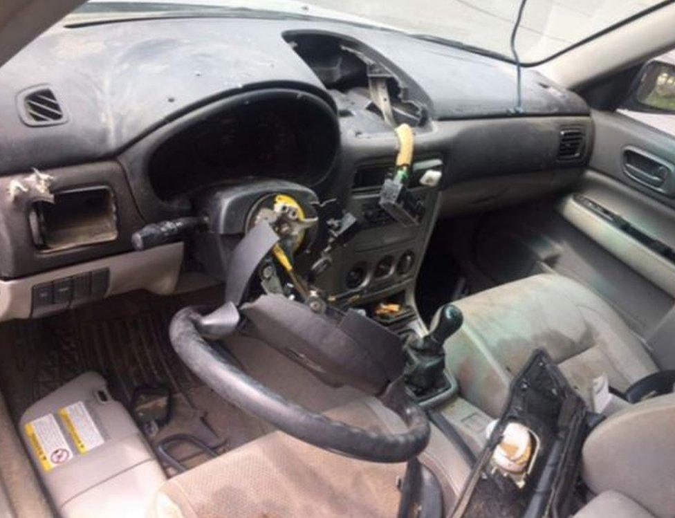 The steering wheel was ripped off the column and the interior was torn apart