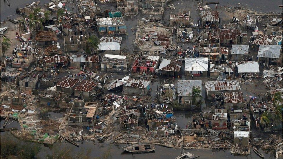 Aerial photo of damaged homes in Haiti