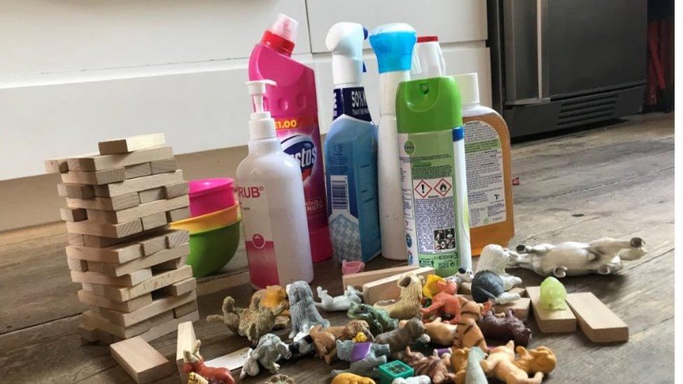 Pile of toys with cleaning products