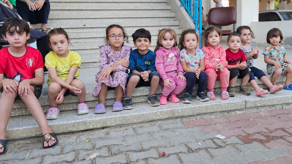 Some of the children staying in Ibrahim AlAagha's parents' house