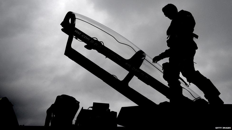 Flight Lieutenant Ian Abson, from RAF 617 squadron based at Lossiemouth inspects a Tornado during War Week Mission Rehearsal Exercise, in preparation for their final Afghanistan deployment on October 2, 2013