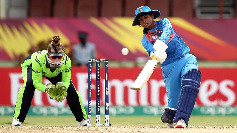 Mithali Raj of India bats with Mary Waldron wicket keeper of Ireland looking on during the ICC Women's World T20 2018 match between India and Ireland at Guyana National Stadium on November 15, 2018 in Providence, Guyana