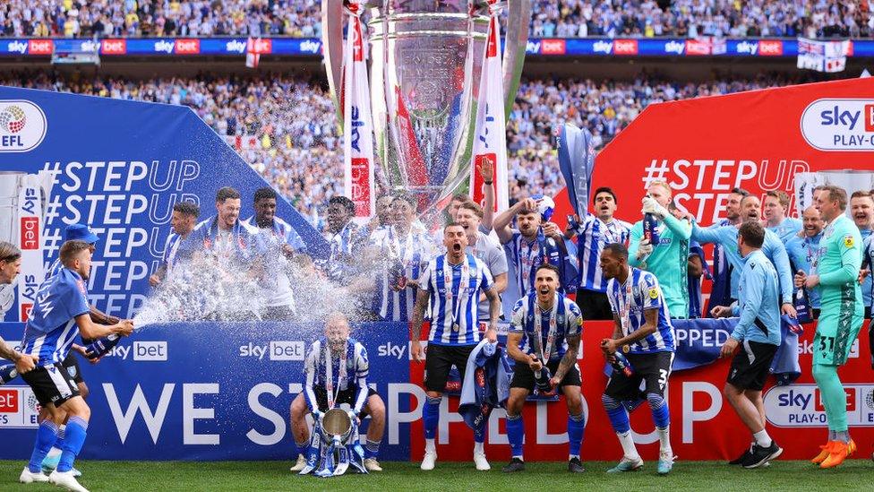 Sheffield Wednesday players celebrate at Wembley after beating Barnsley