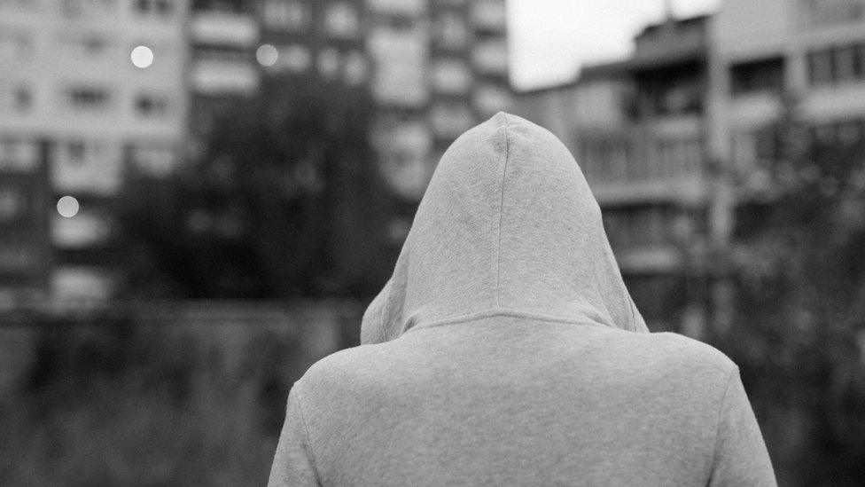 Woman in hoodie