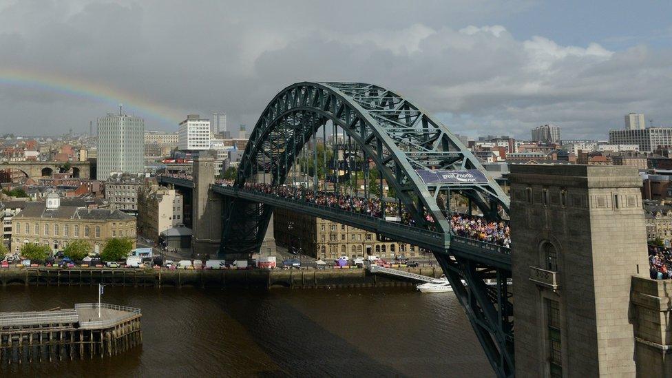 Great North Run runners crossing the Tyne Bridge