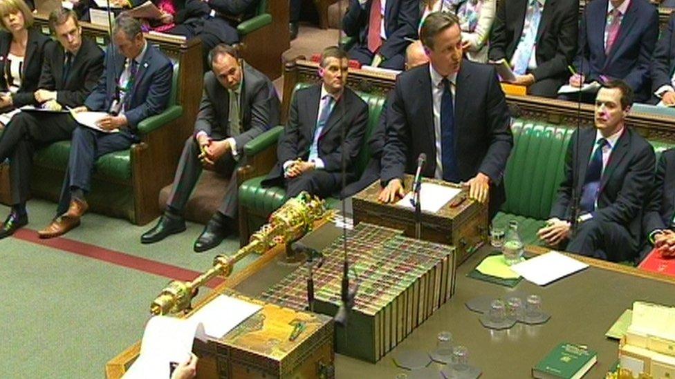 David Cameron standing at the dispatch box in the Commons