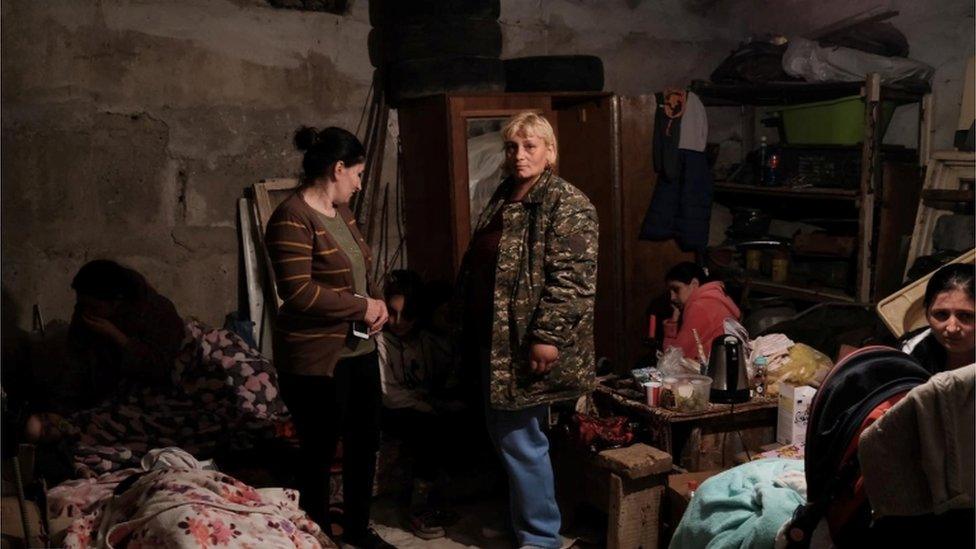 Residents including children have taken cover in bomb shelters during shelling in the capital Stepanakert