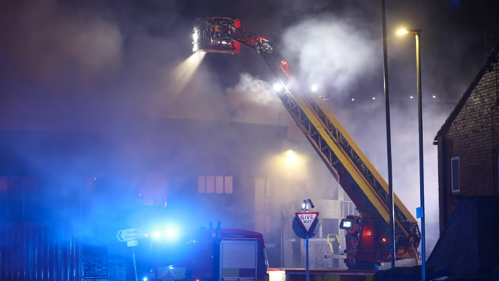 The huge fire broke out on Monday night as crews evacuated nearby homes