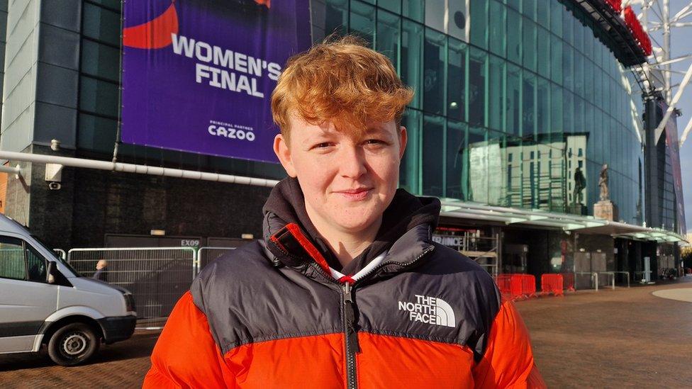 Fan outside Old Trafford Stadium