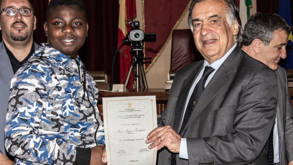 The mayor of Palermo Leoluca Orlando (R) at a citizenship ceremony in Palermo - 2019