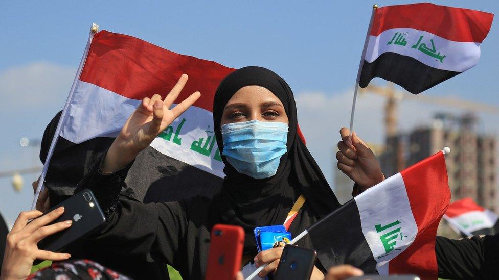 An Iraqi woman takes part in an anti-government protest in the central city of Karbala (31 October 2019)